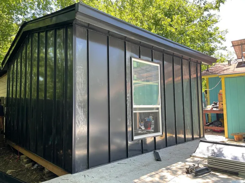 Black standing seam metal wall panels for Roof Inspection in Leacock